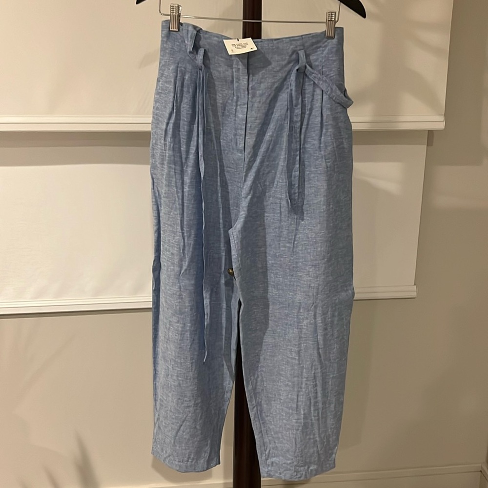 Light Blue with Linen pants. .side pockets and belt